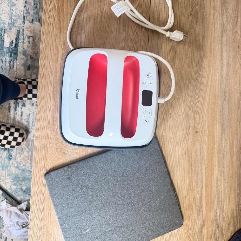 Cricut Heat Press with Vibrant Red Highlights
